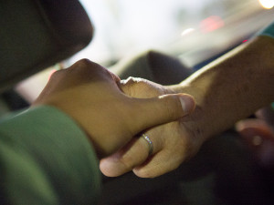 Holding hands on the car ride home.